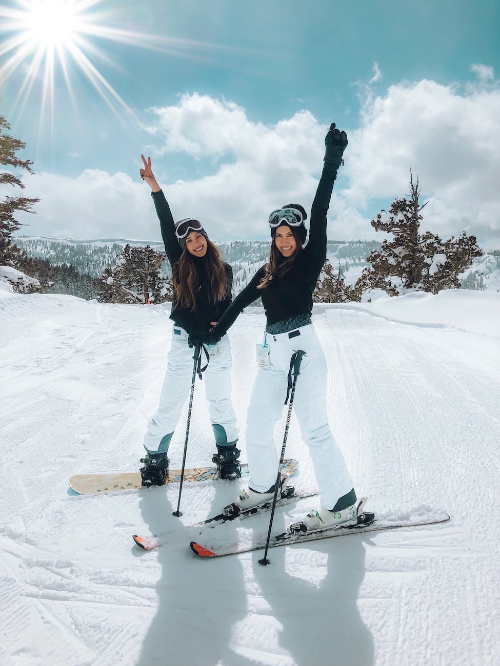 photo of two women skiing